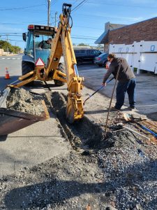 Public Works digging the drainage vault on Farmington Street